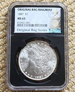 Pre-1921 NGC MS-63 Morgan Silver Dollar in Original Bag Fragment Holder